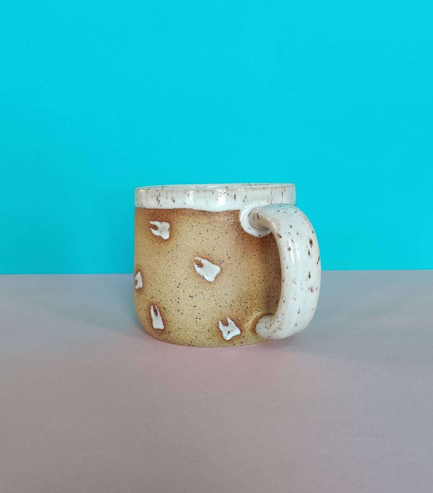 Floating Tooth Mug