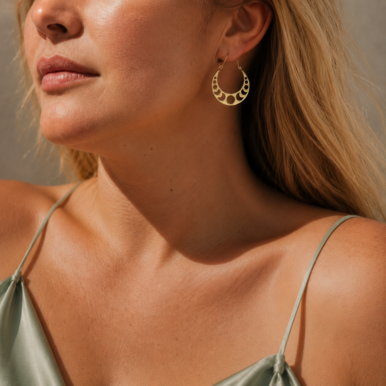 Moon phase gold dangle earrings by Anokhi Green, view 2