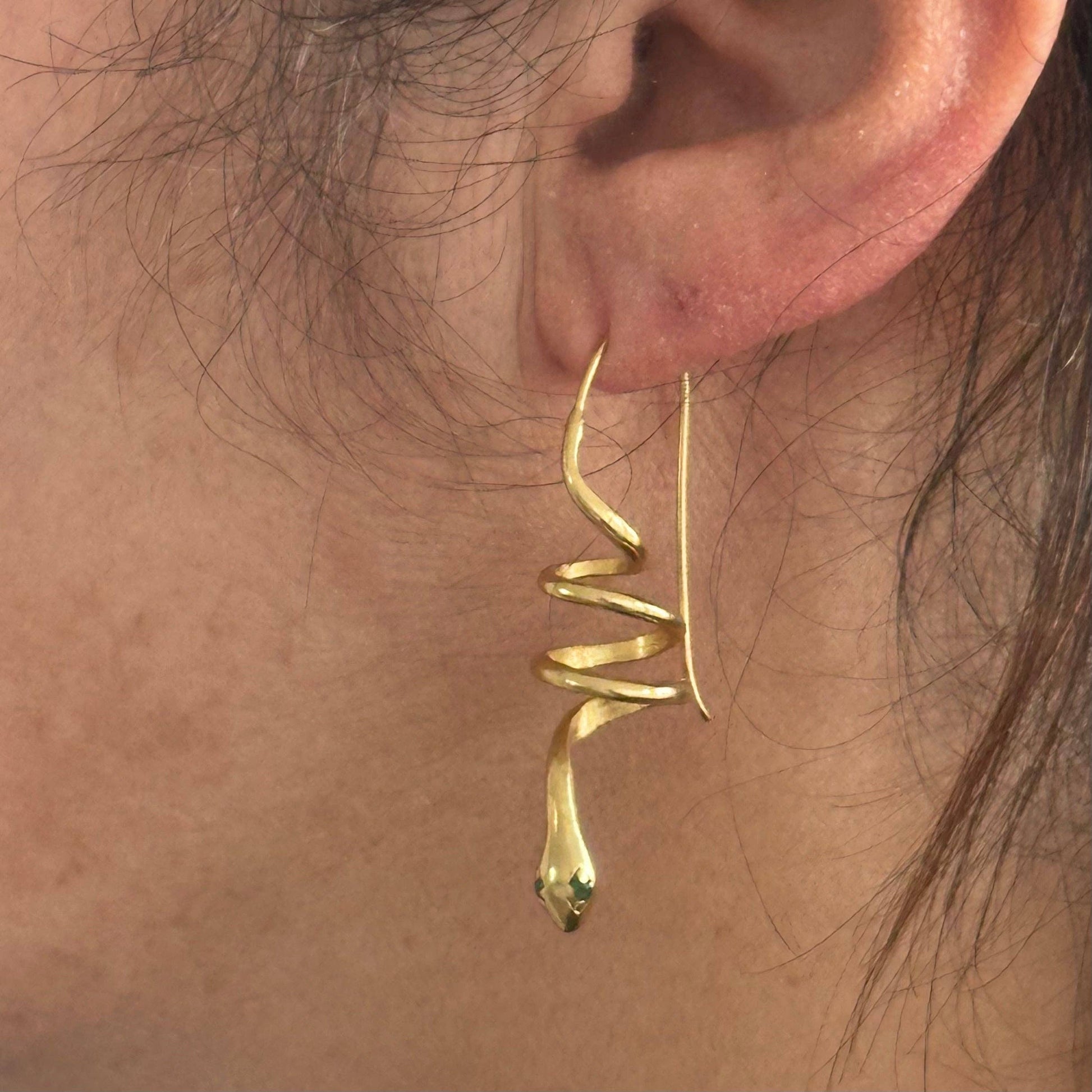 Gold snake earrings with green zircon eyes by Anokhi Green, view 7