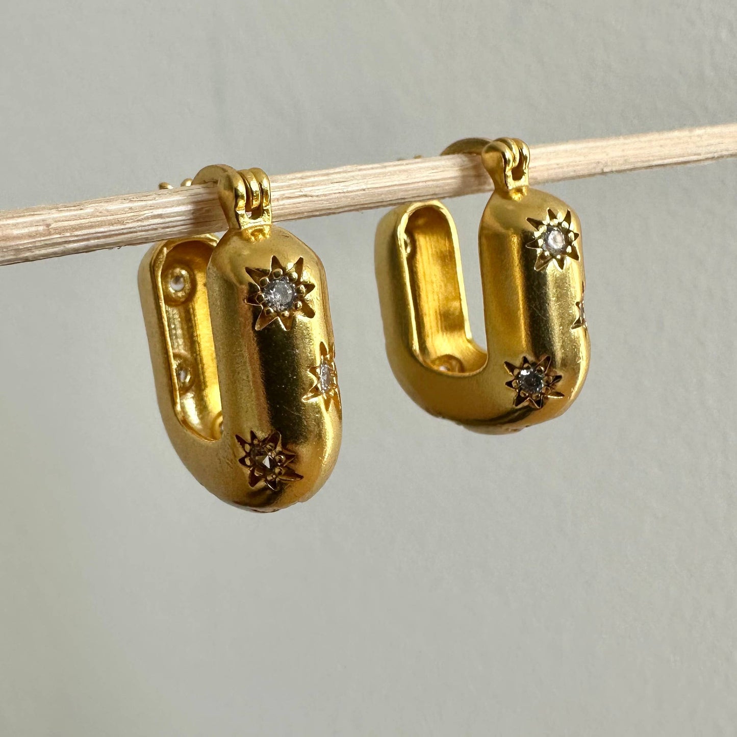 Chic modern star gold hoop earrings by Anokhi Green, view 3