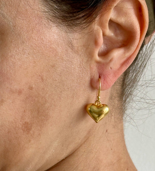 Small hearts gold dangle earrings by Anokhi Green, view 2