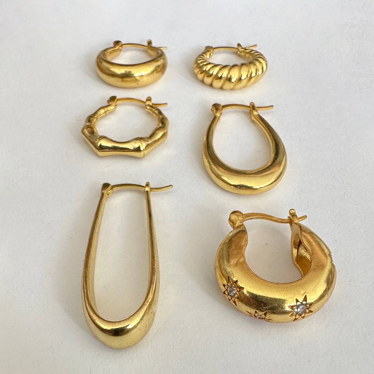 Star gold hoop earrings with zircon by Anokhi Green, view 3