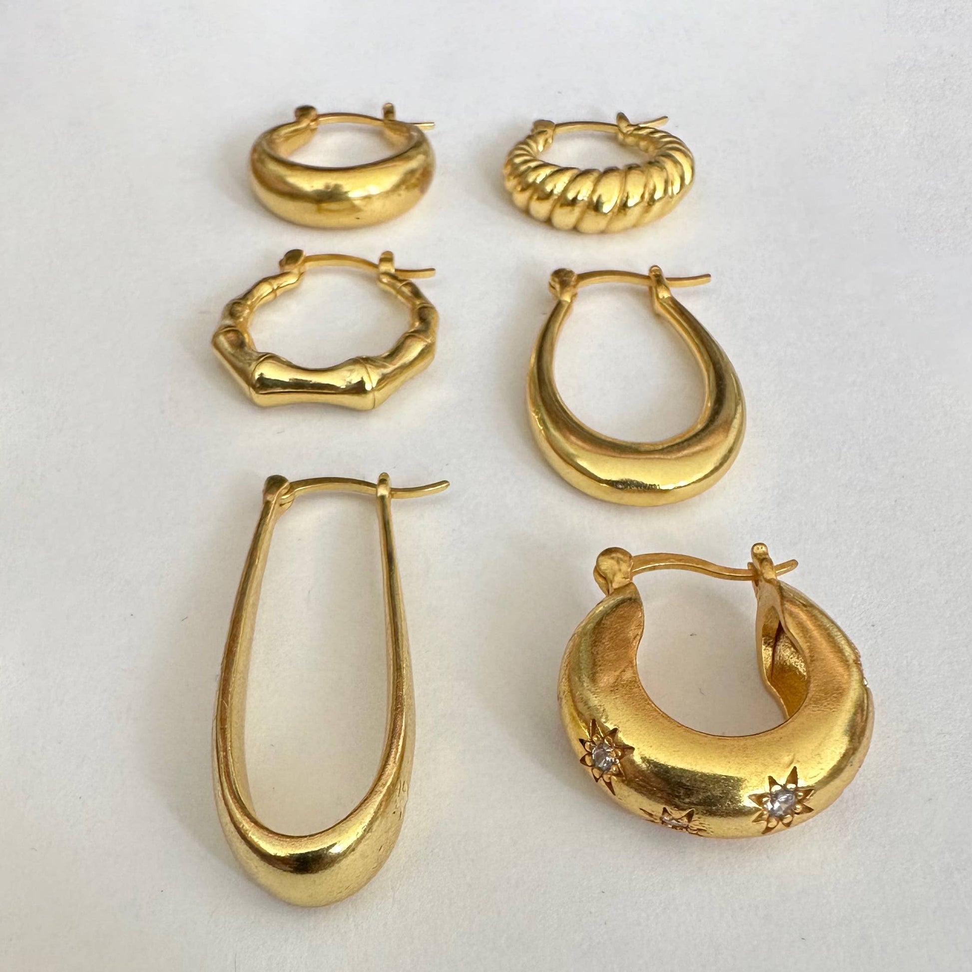 Star gold hoop earrings with zircon by Anokhi Green, view 3
