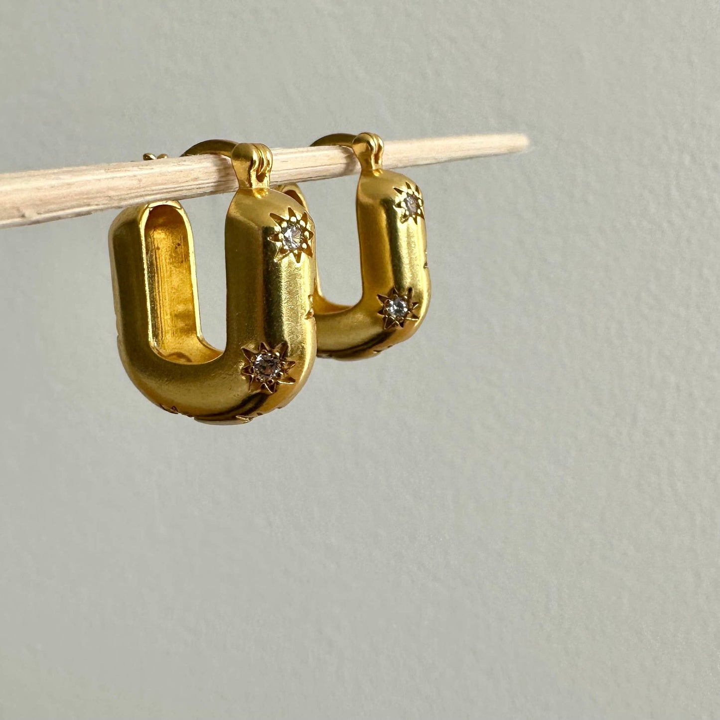 Chic modern star gold hoop earrings by Anokhi Green, view 4