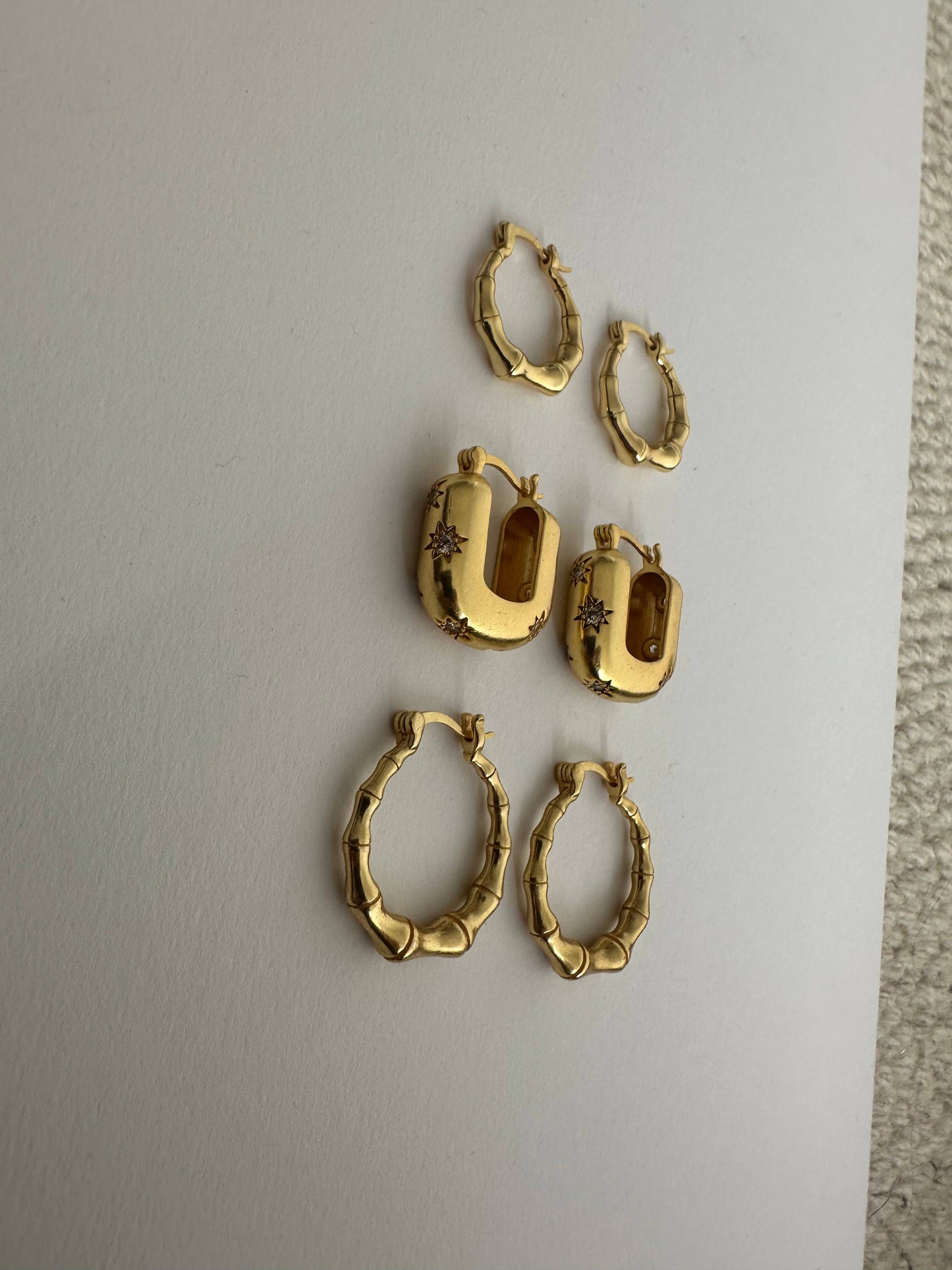 Chic modern star gold hoop earrings by Anokhi Green, view 6