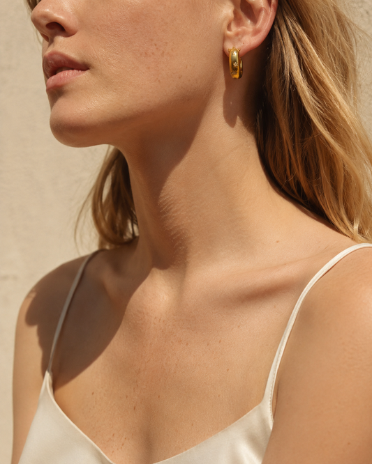 Chic modern star gold hoop earrings by Anokhi Green, view 2