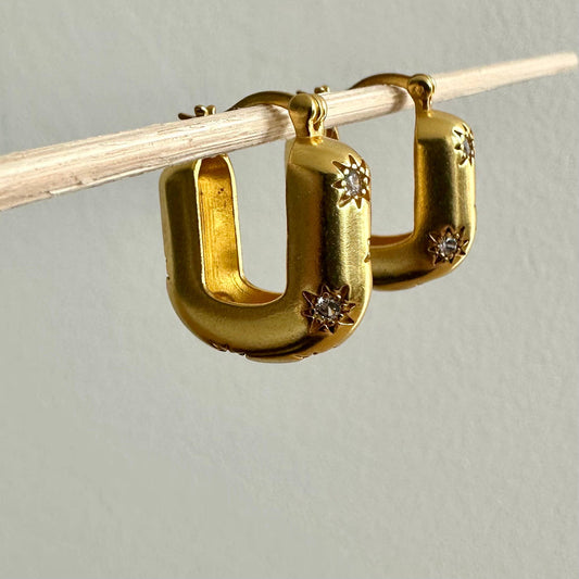 Chic modern star gold hoop earrings by Anokhi Green