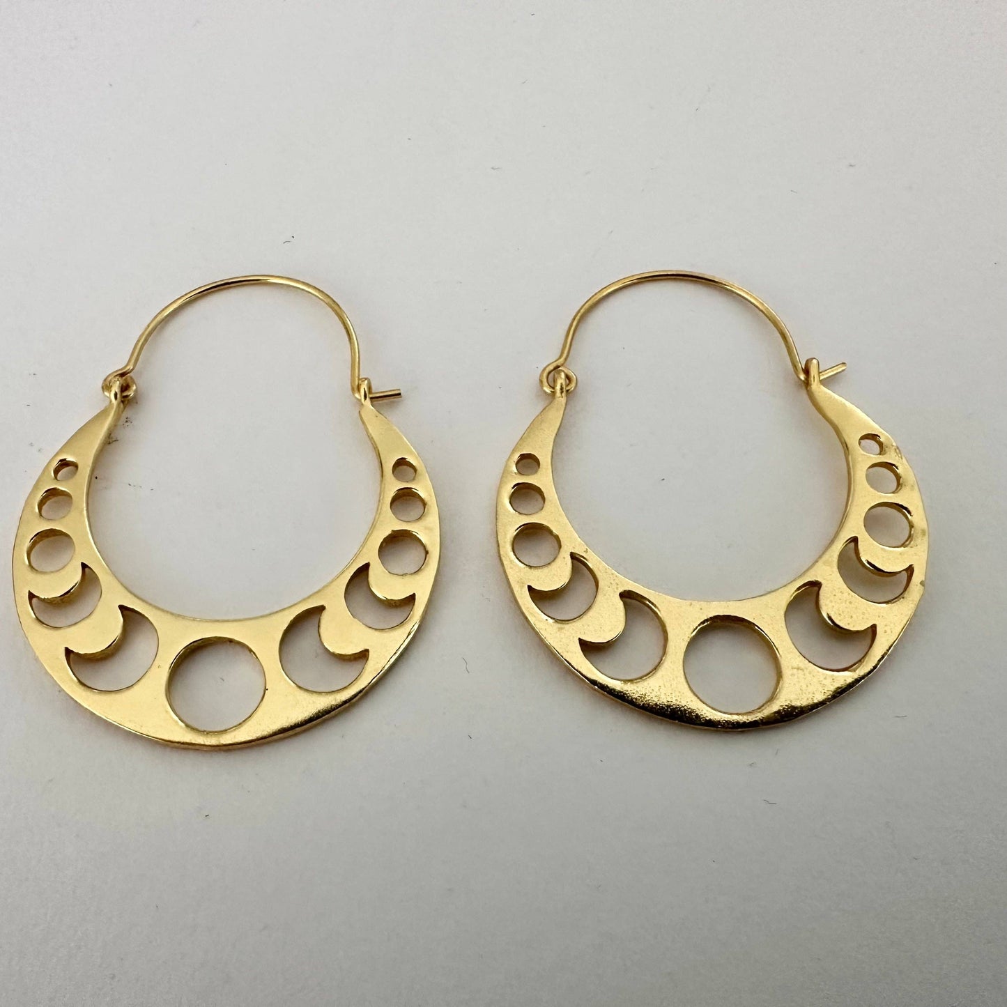 Moon phase gold dangle earrings by Anokhi Green