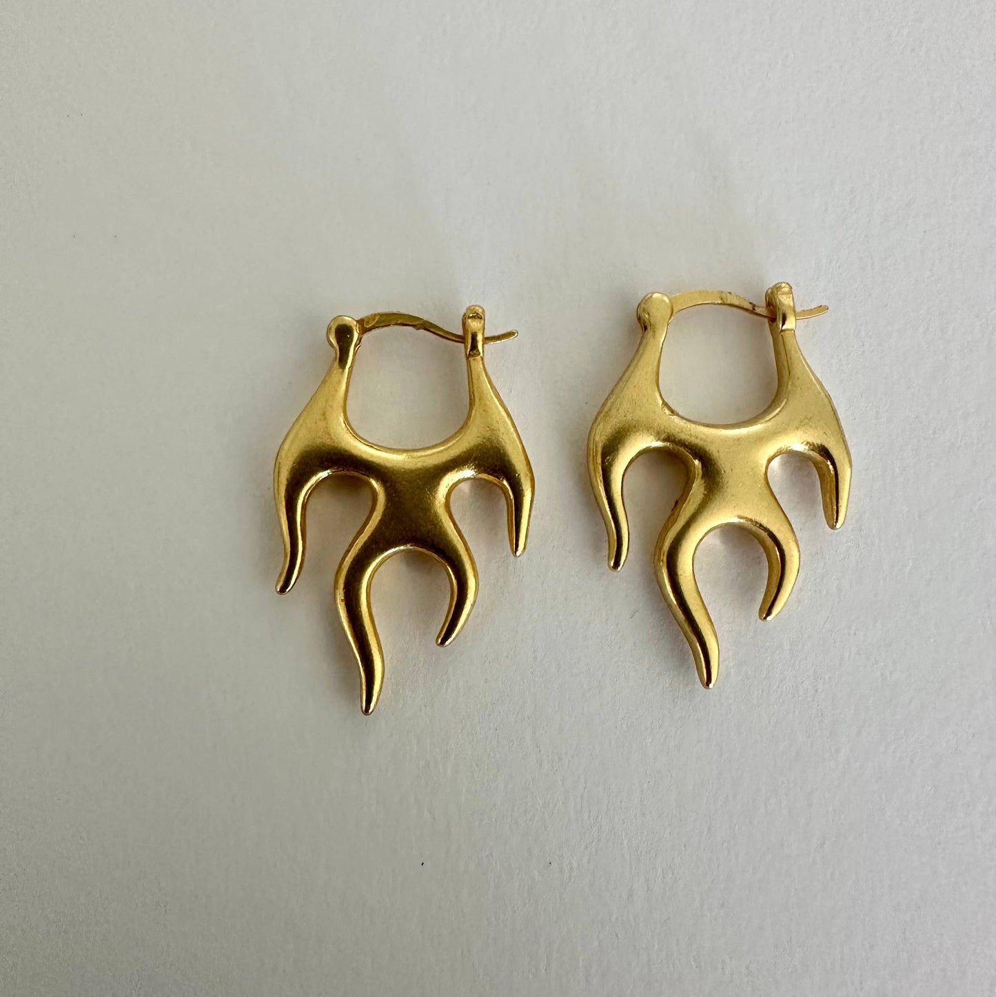 Flame fire gold hoop earrings by Anokhi Green