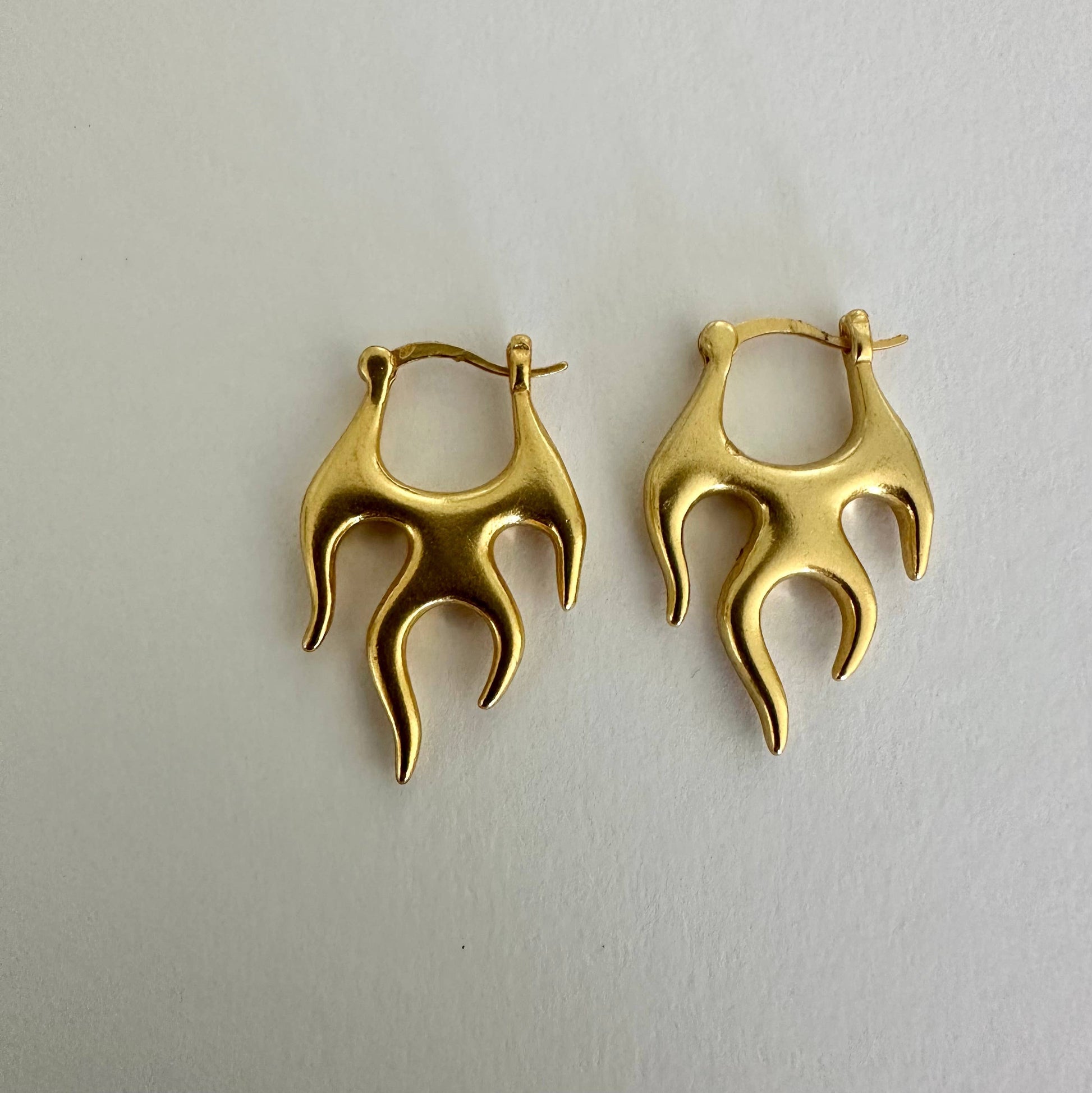 Flame fire gold hoop earrings by Anokhi Green